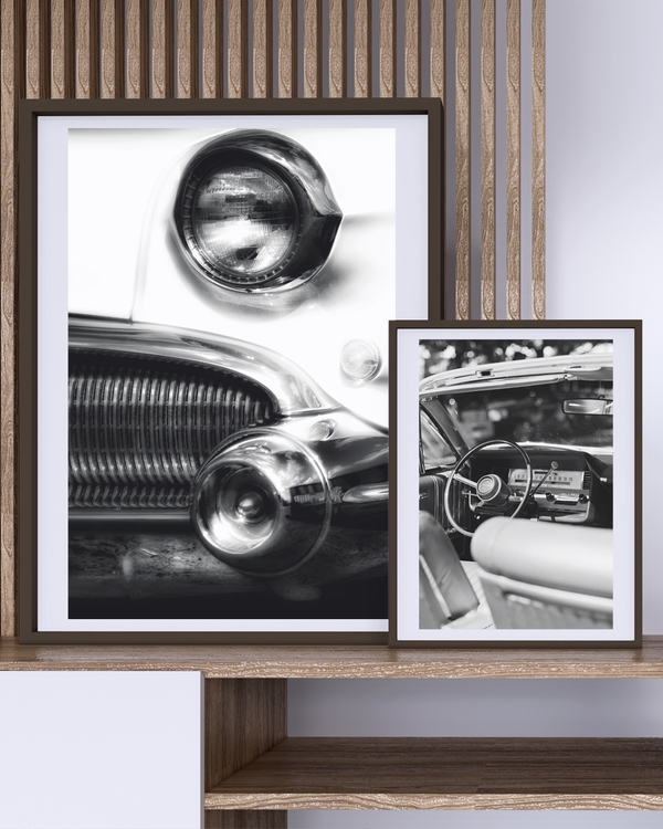 A poster of a Black and white close up of classic car front