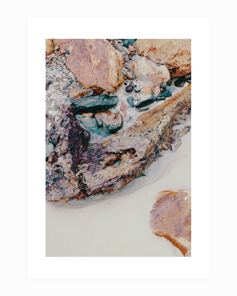 A poster of a Layered stones and sand textures in earthy muted tones