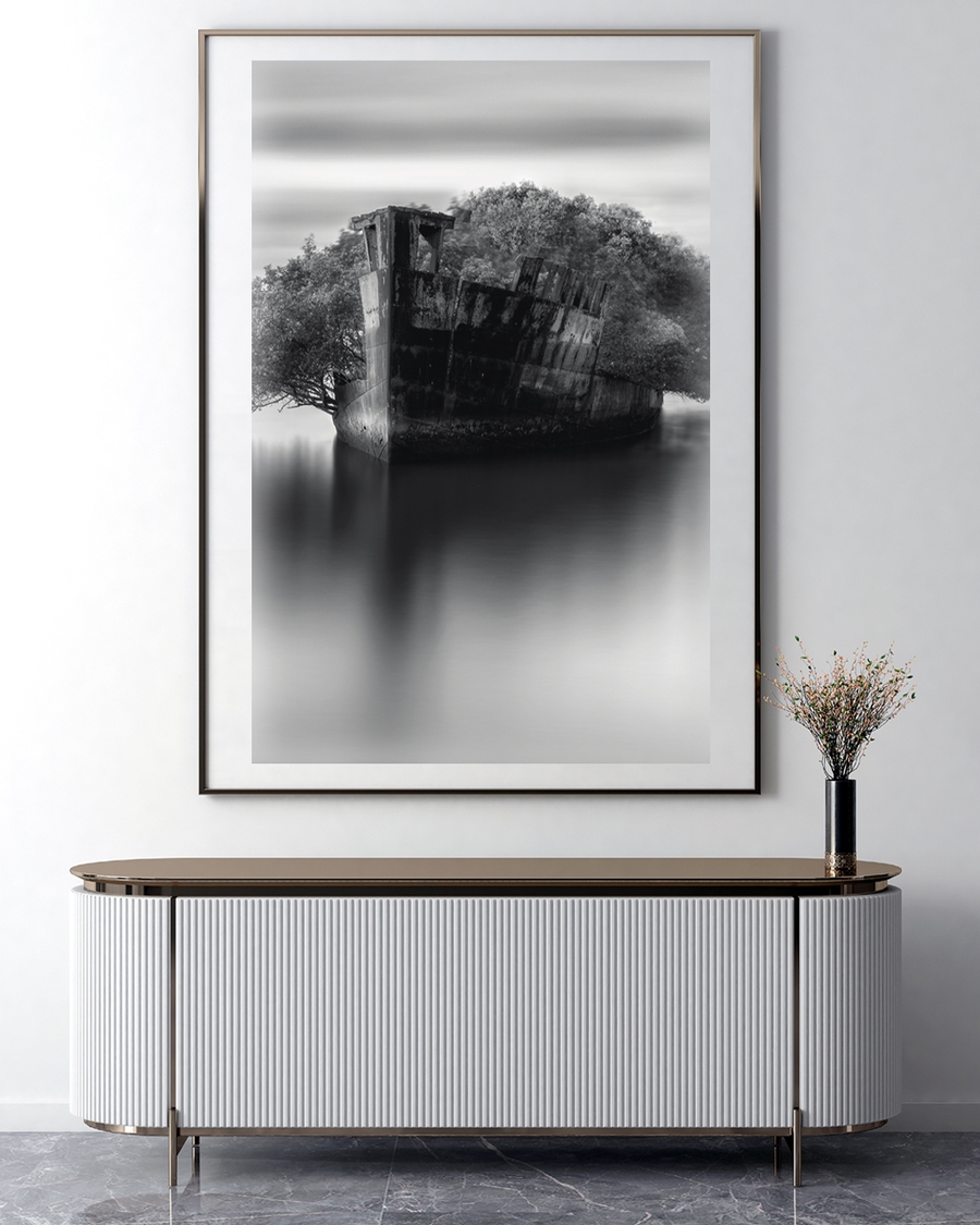 A poster of a Abandoned shipwreck reflected in calm monochrome water