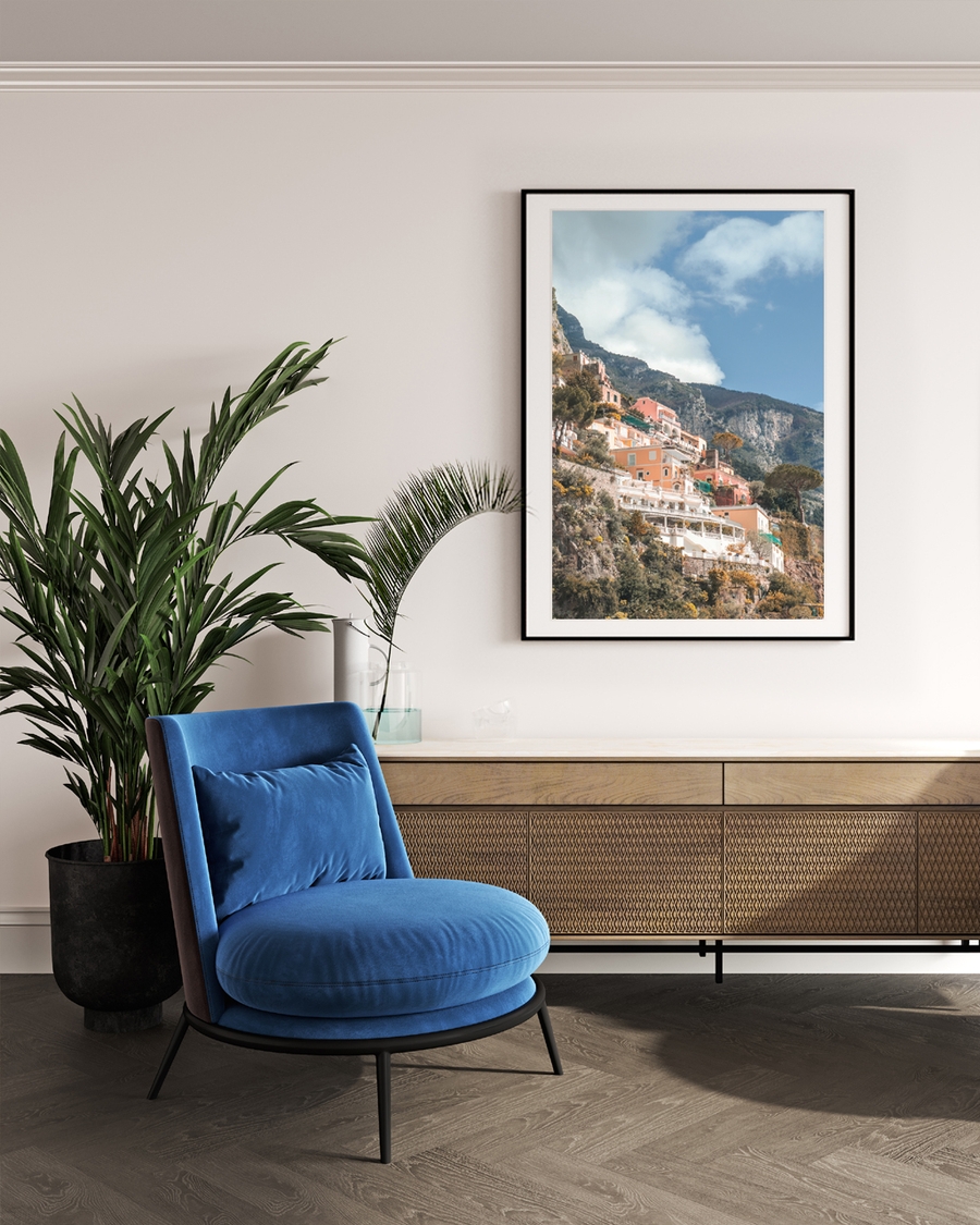 A poster of a Coastal houses on cliffs under clear sky