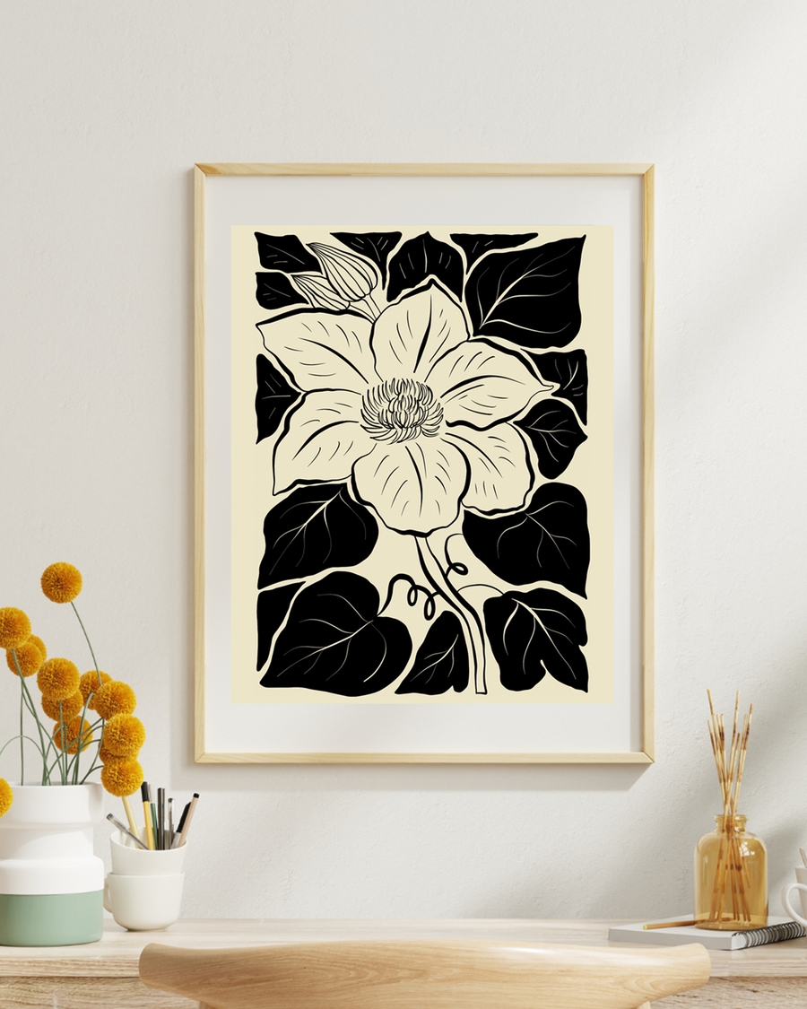 A poster of a botanical flower illustration with bold black leaves