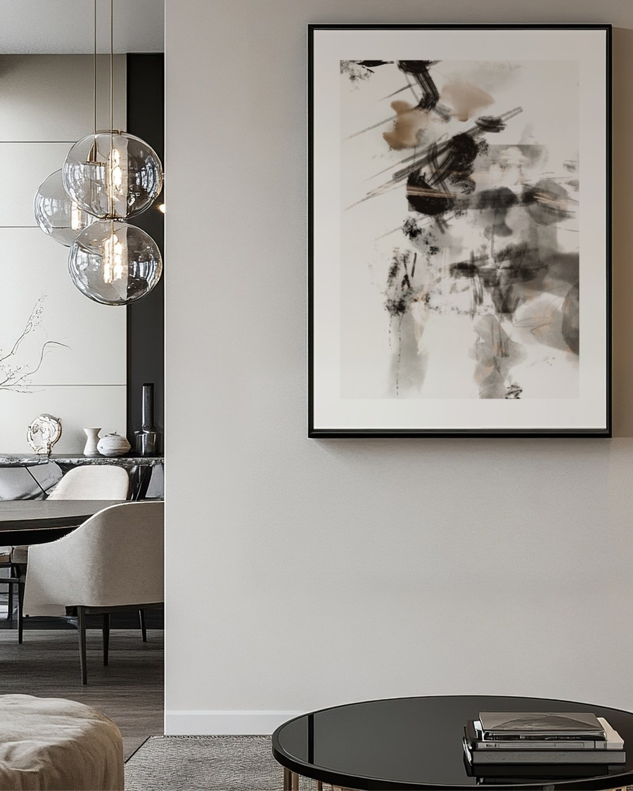 Ink Drift poster in a slim black frame on a pale wall in a modern living room