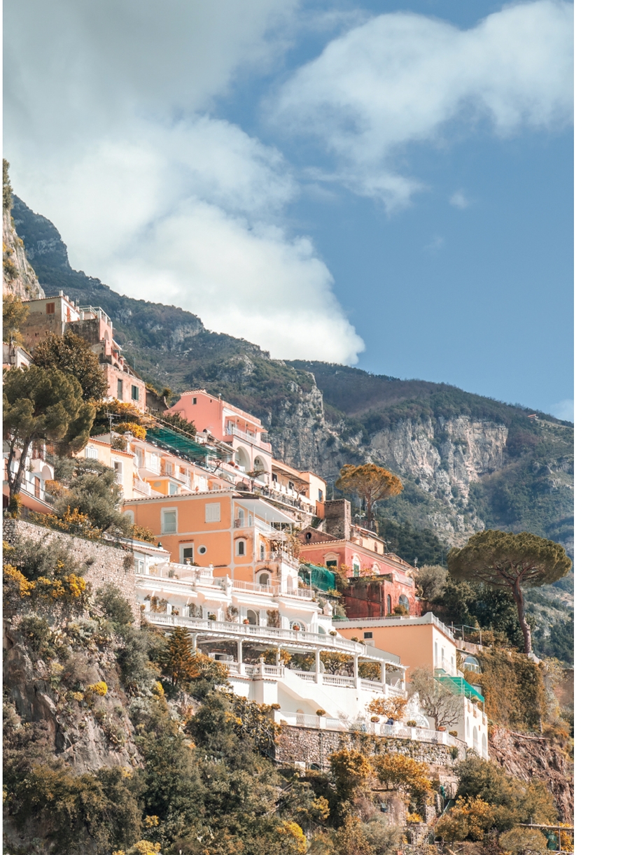Coastal houses on cliffs under clear sky