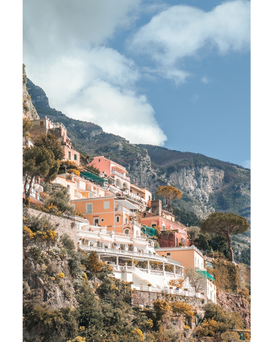 Coastal houses on cliffs under clear sky