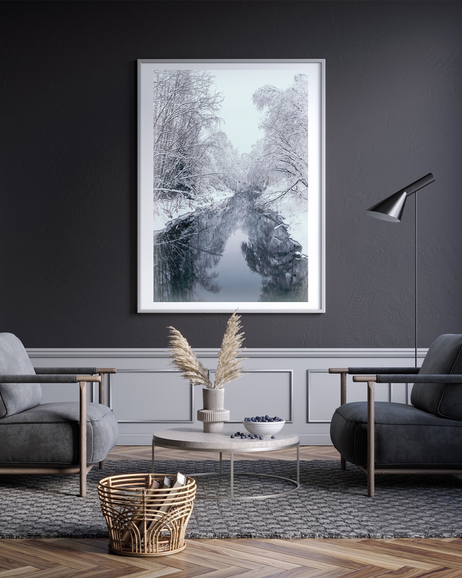 A poster of a Snow covered trees reflected along quiet winter stream