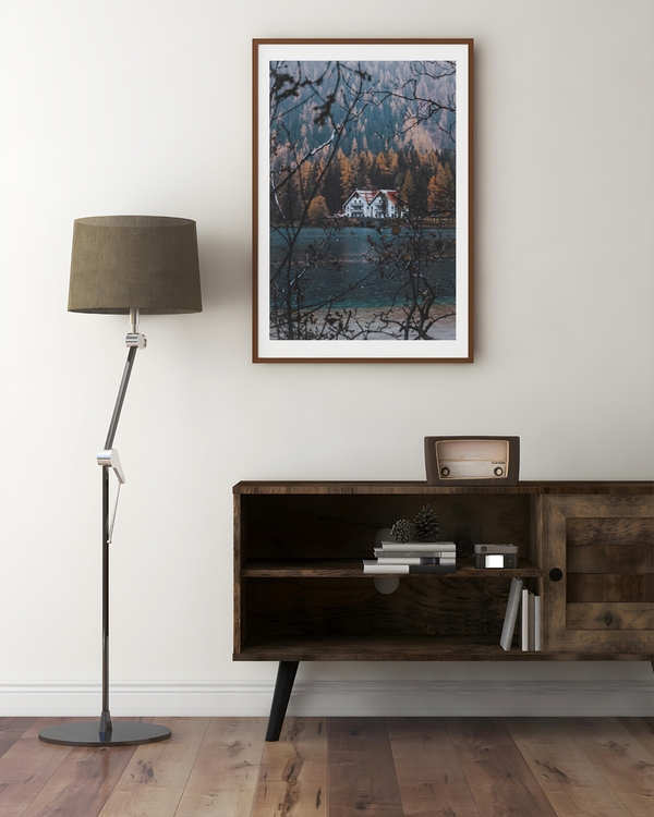  A poster of a White house by lake surrounded by autumn forest