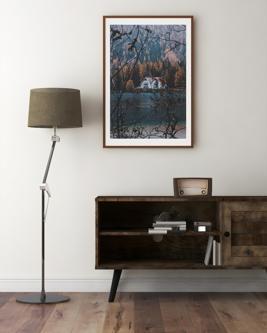  A poster of a White house by lake surrounded by autumn forest