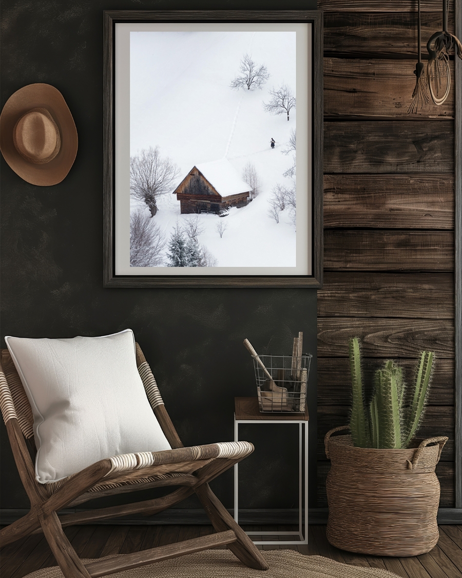 A poster fo a wooden cabin in snowy landscape with bare trees