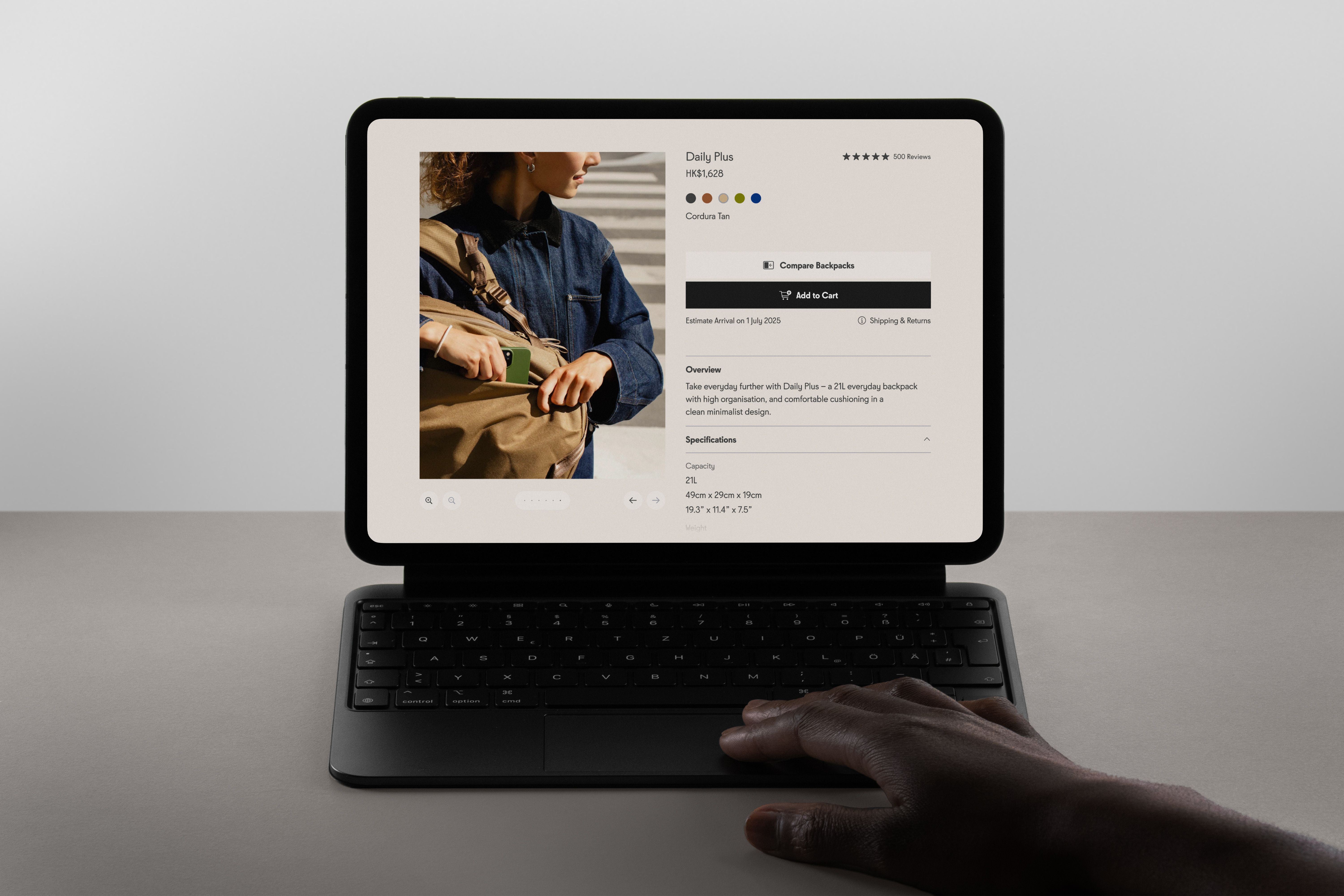 An iPad Pro displaying Able Carry's Backpack Compare page on its monitor.
