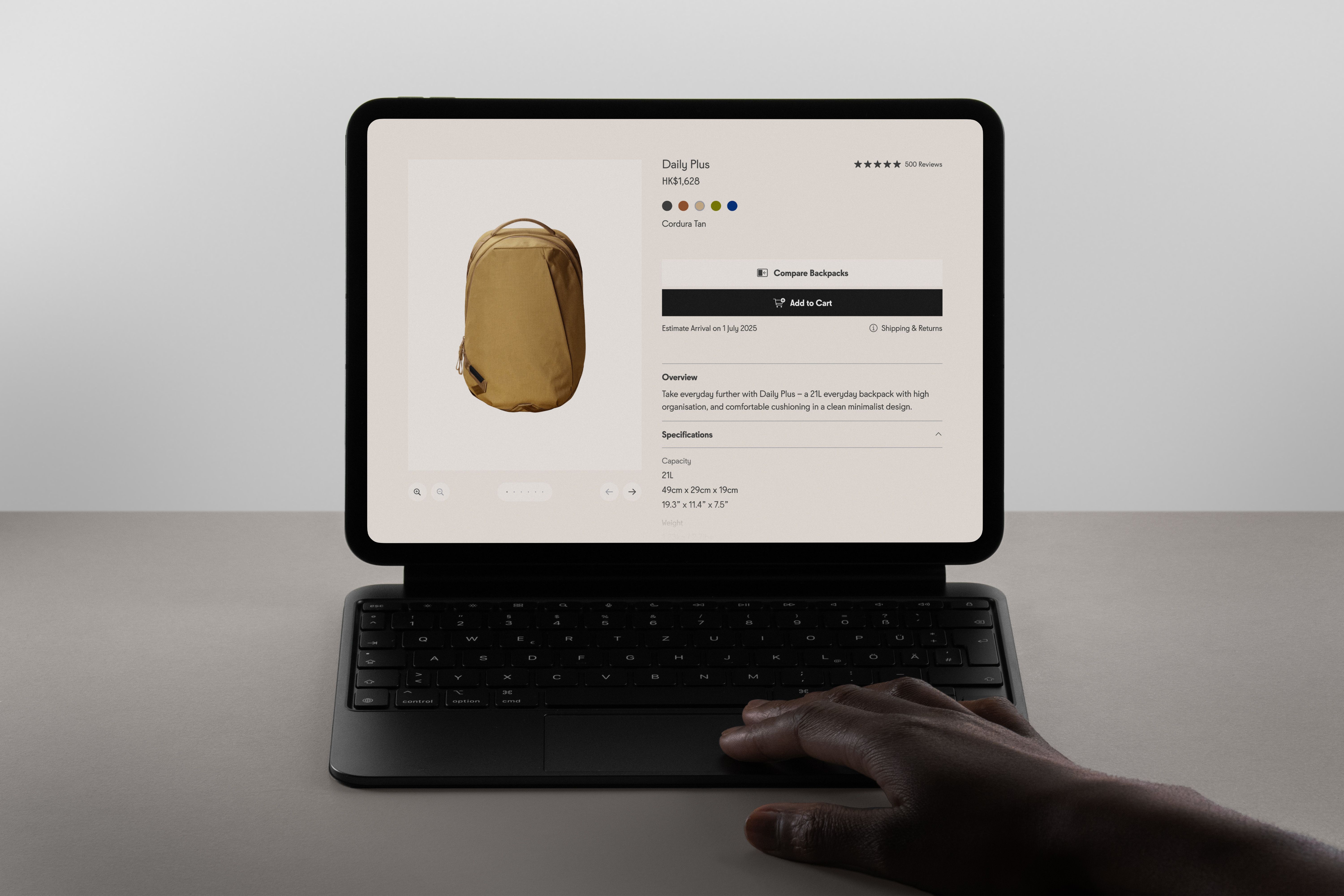 An iPad Pro displaying Able Carry's Backpack Compare page on its monitor.