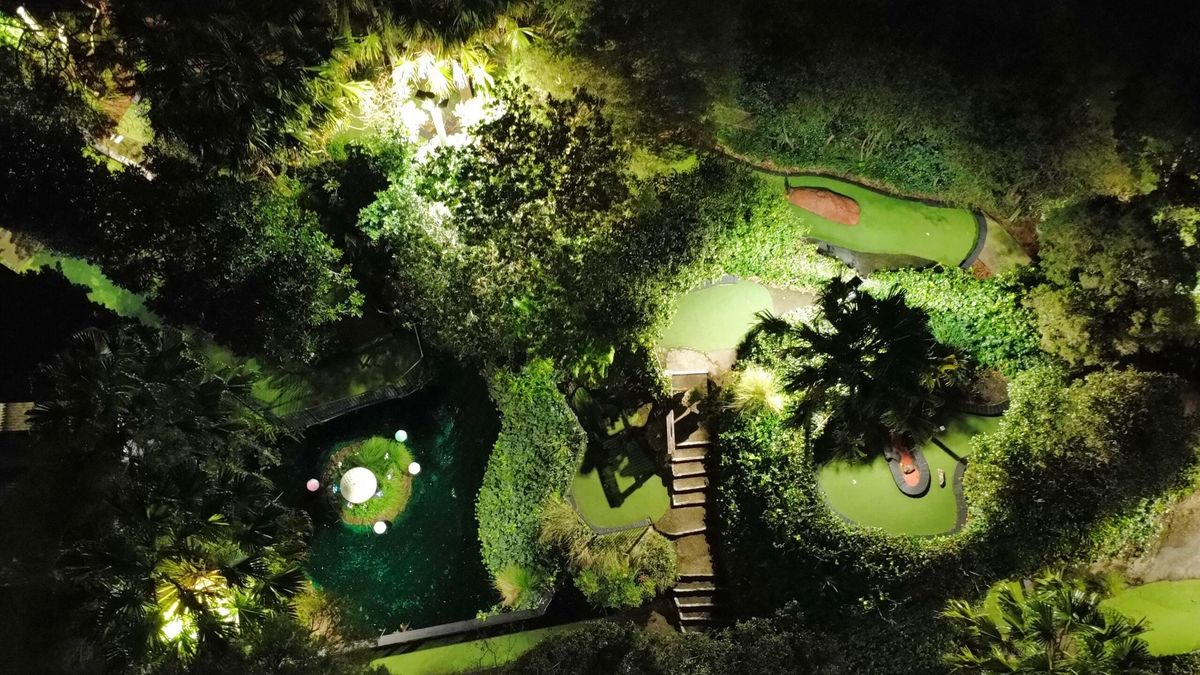 Aerial night view of the mini-golf greens and gardens at Pittwater Golf Centre
