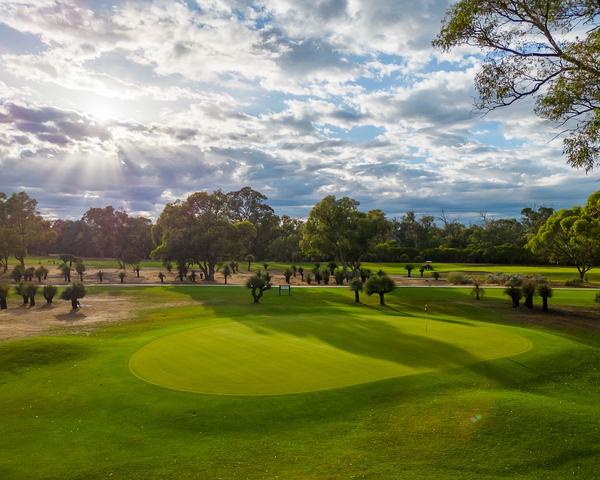 Putting green at sunset at Rockingham Golf Club