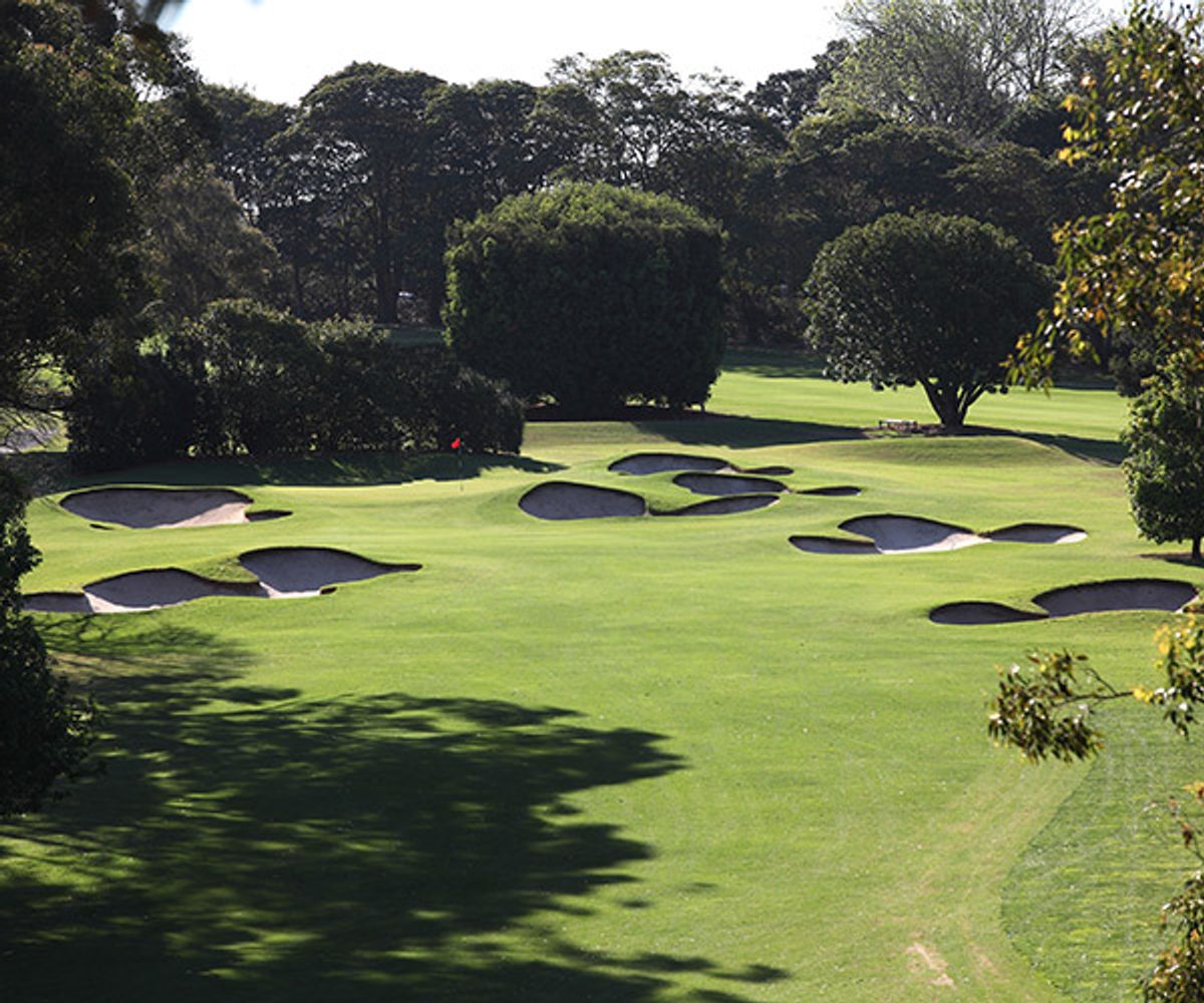 A green guarded by curved bunkers at Pennant Hills Golf Club, Sydney