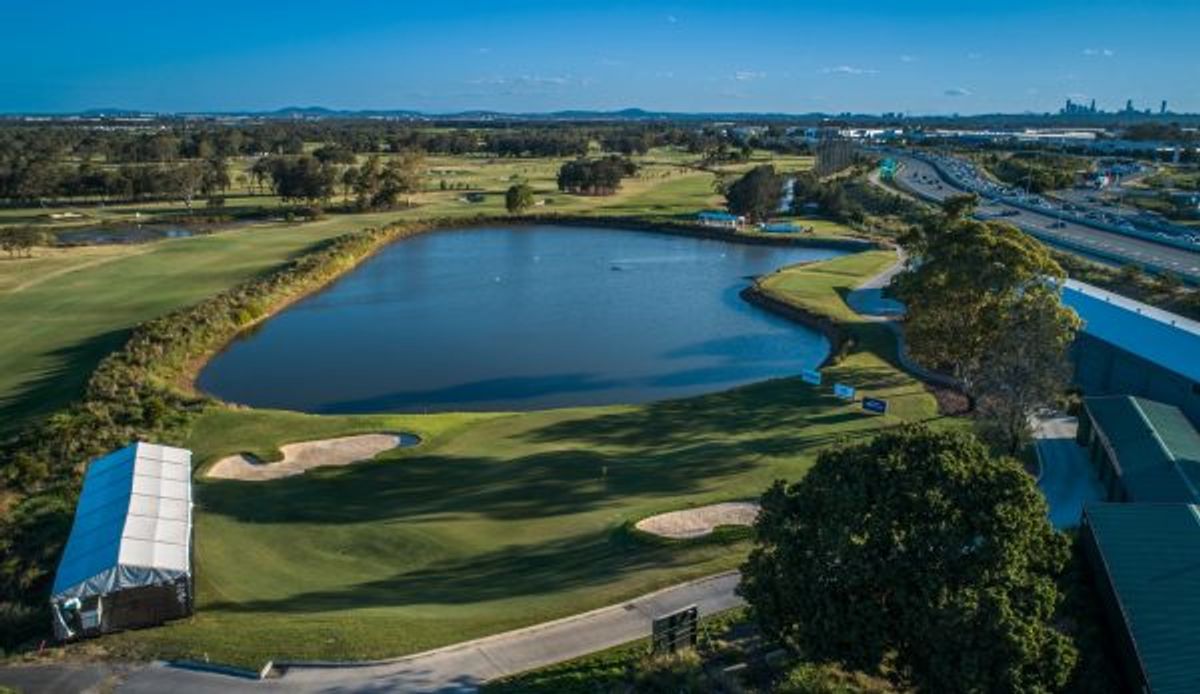 A golfer teeing off on the fairway at Nudgee Golf Club