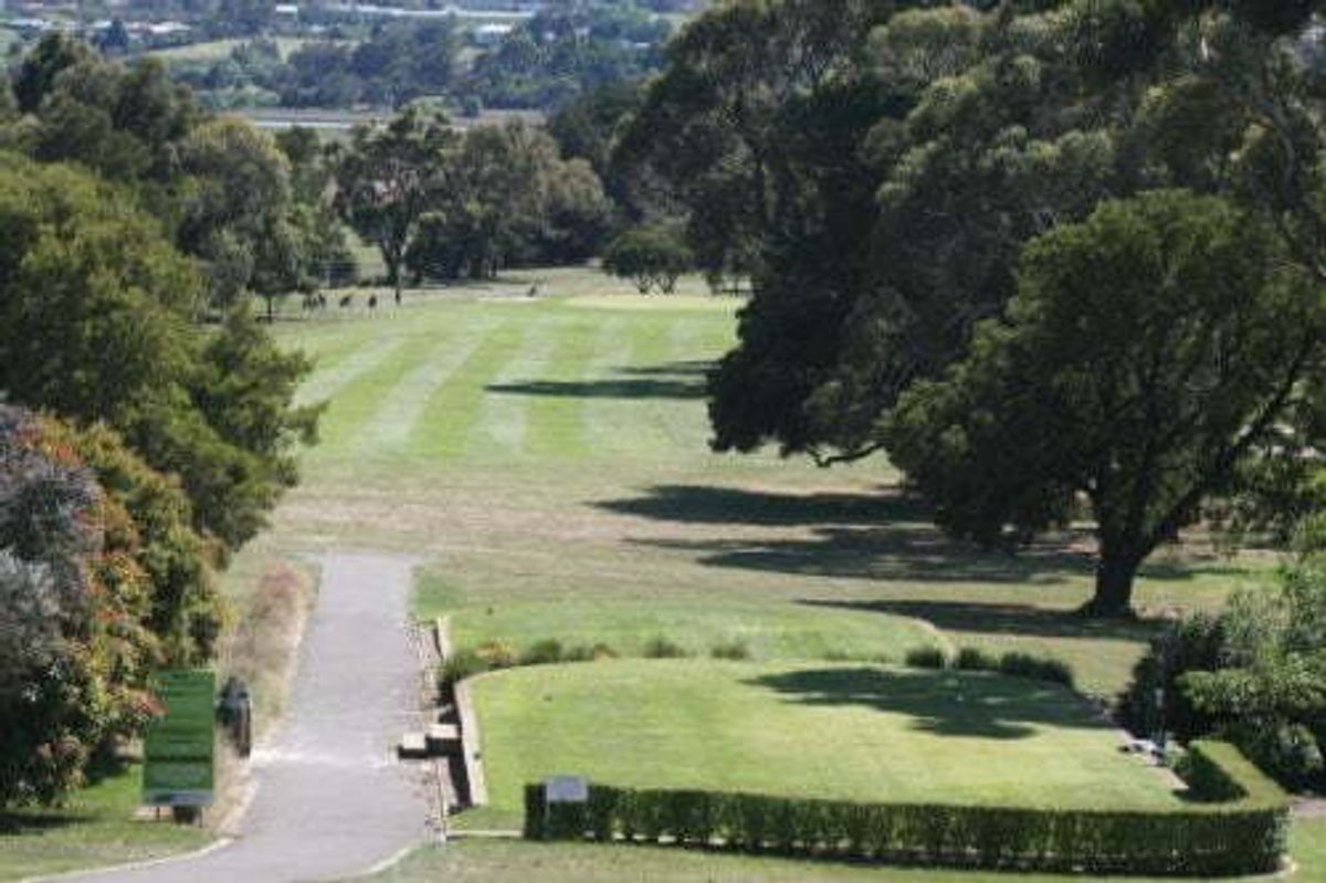 View down a tree-lined fairway at Riverside Golf Club