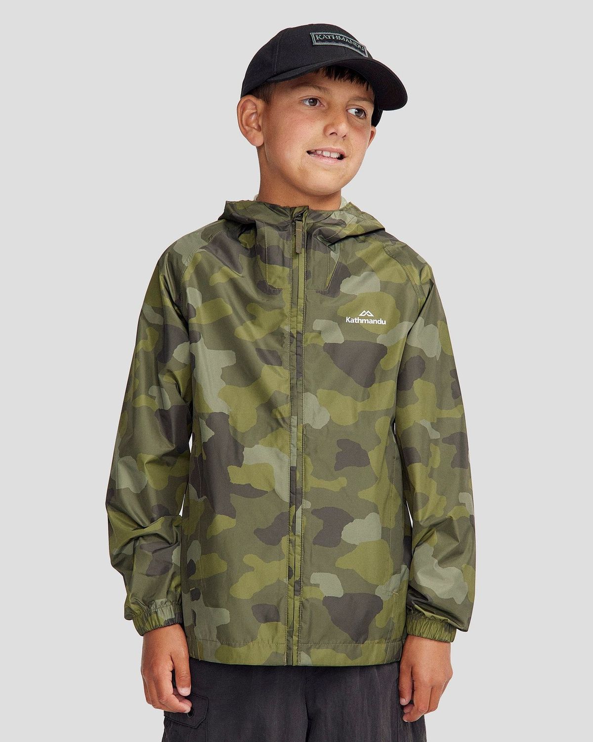 Kathmandu Youth Pocket-it 2-layer Rain Jacket - Light Moss Tree Camo Print