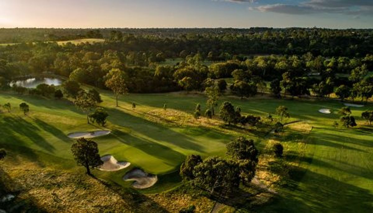 Aerial view of fairways and bunkers at Rosanna Golf Club, Melbourne, at sunset