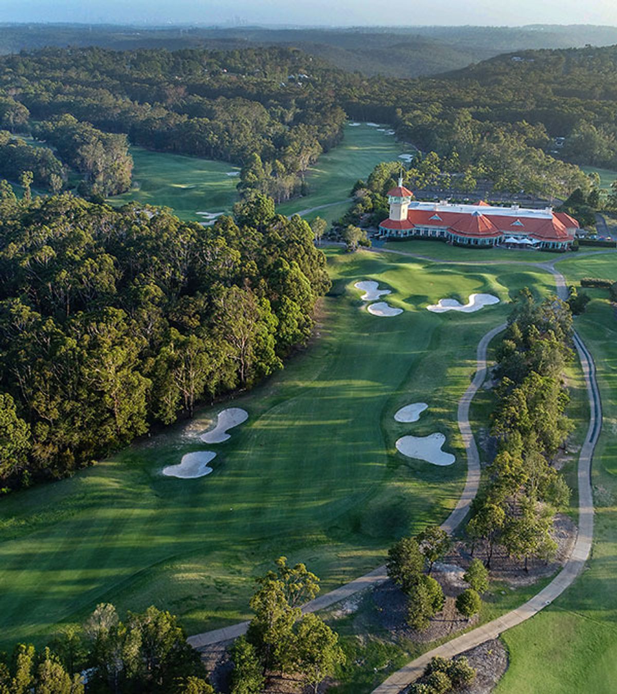 Aerial view of the clubhouse and bunkered fairways at Terrey Hills Golf and Country Club, Sydney