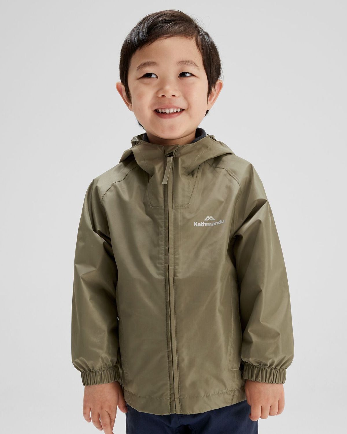 Kathmandu Pocket-it 2L Kids Rain Jacket v4 - Beech