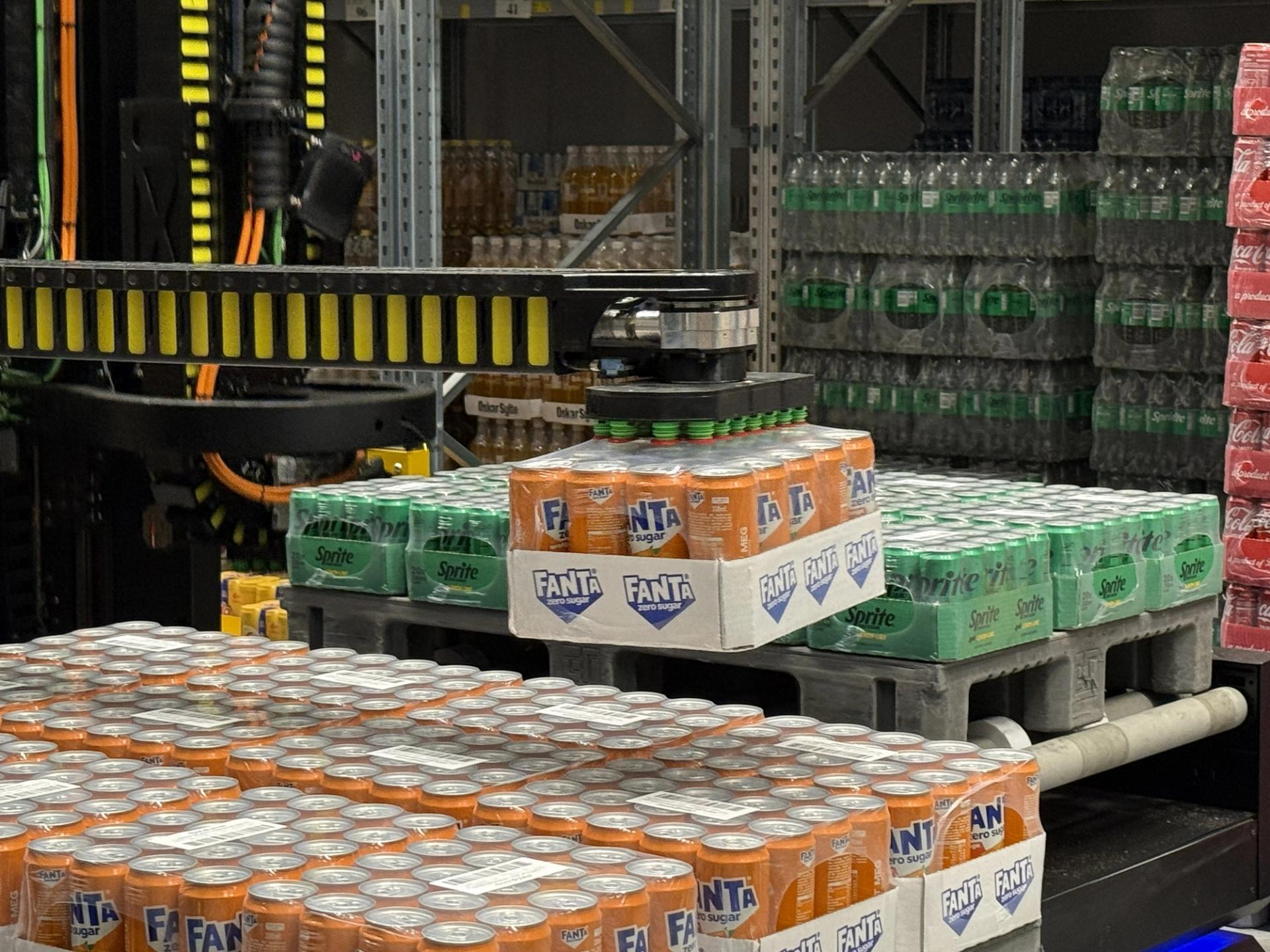 Fleet of 3 mobile picking robots deployed in brownfield warehouse