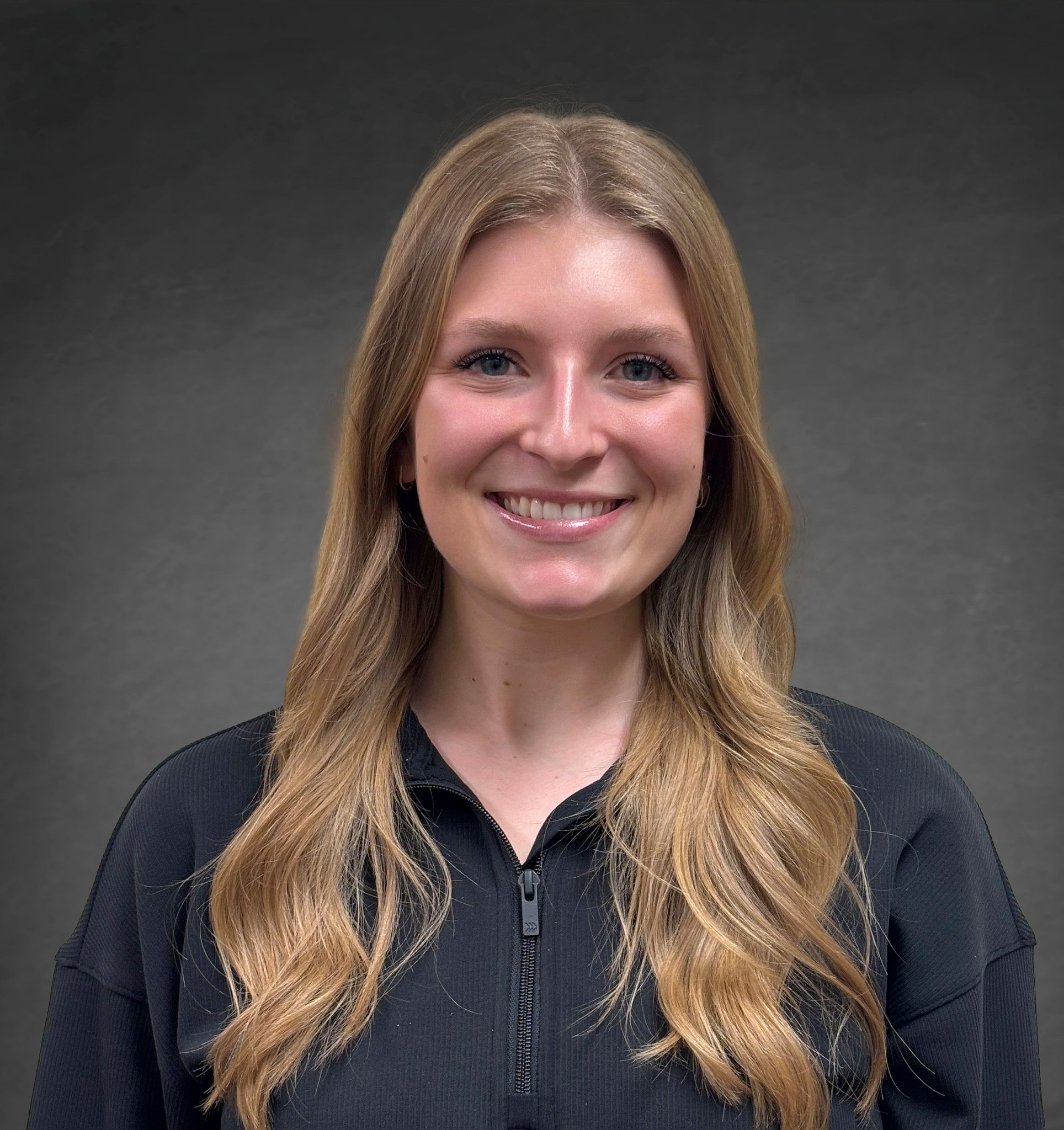 Headshot of Kenzie Herbst