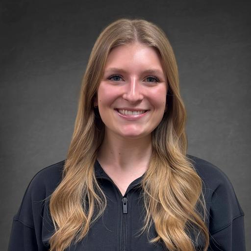 Headshot of Kenzie Herbst
