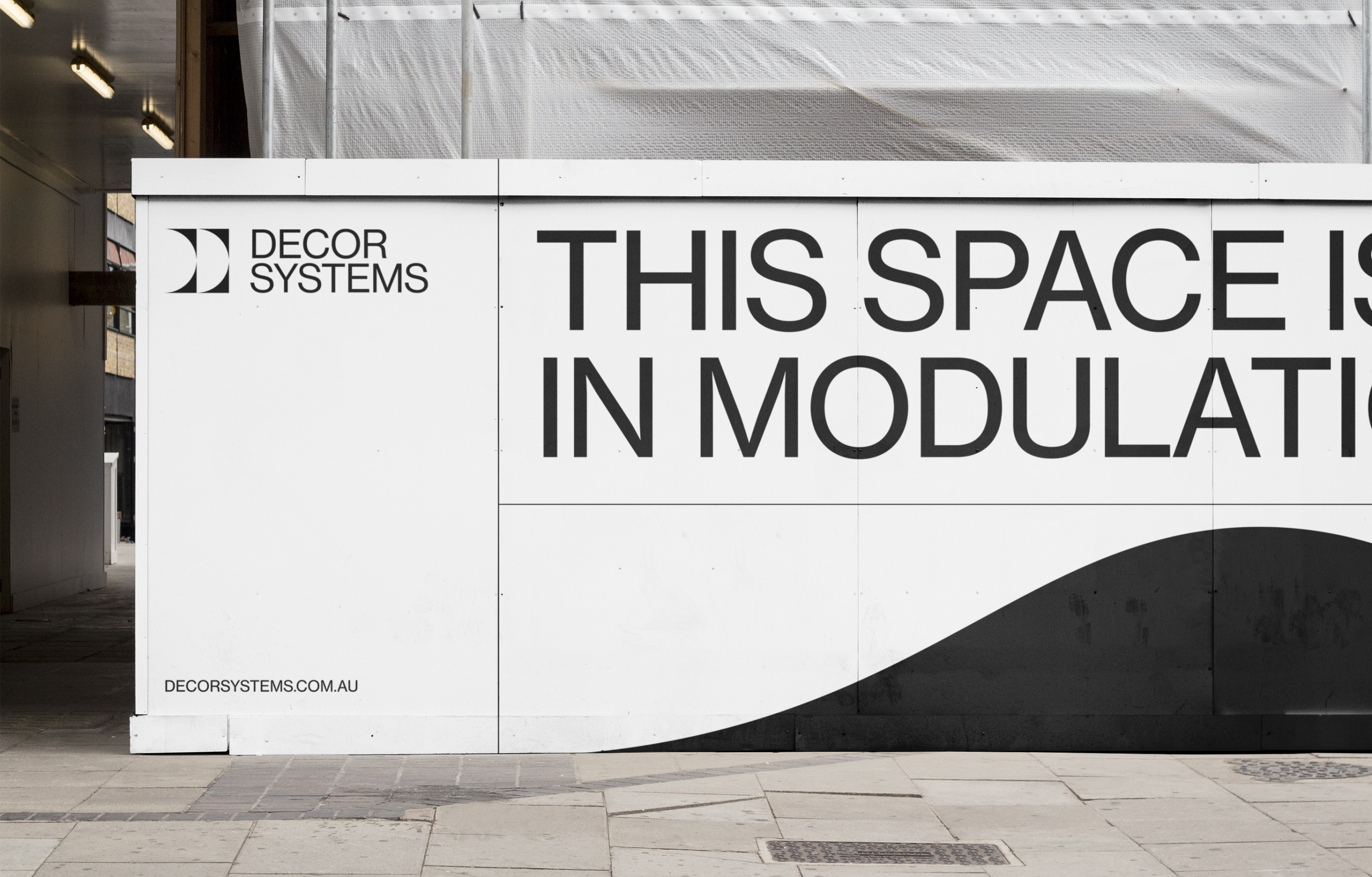 Decor systems advertisement on side of a wall