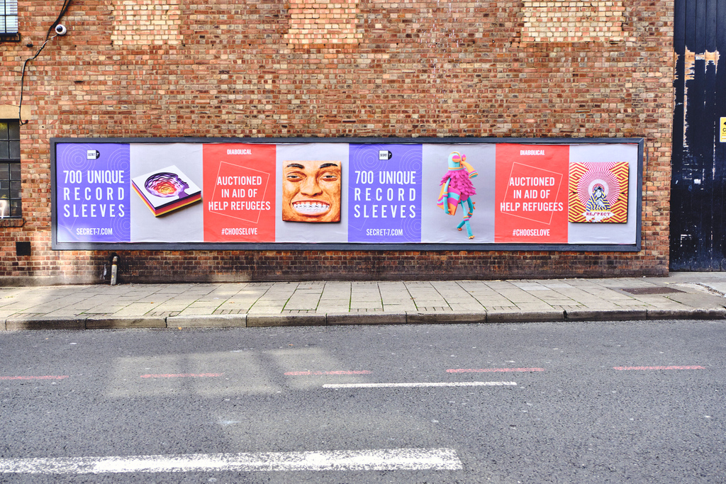 Very long horizontally Secret7" billboard in London