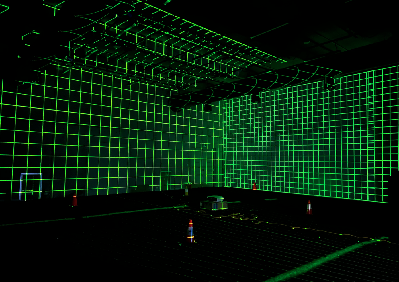 ALNF projection mapping, green lines on walls in a black room