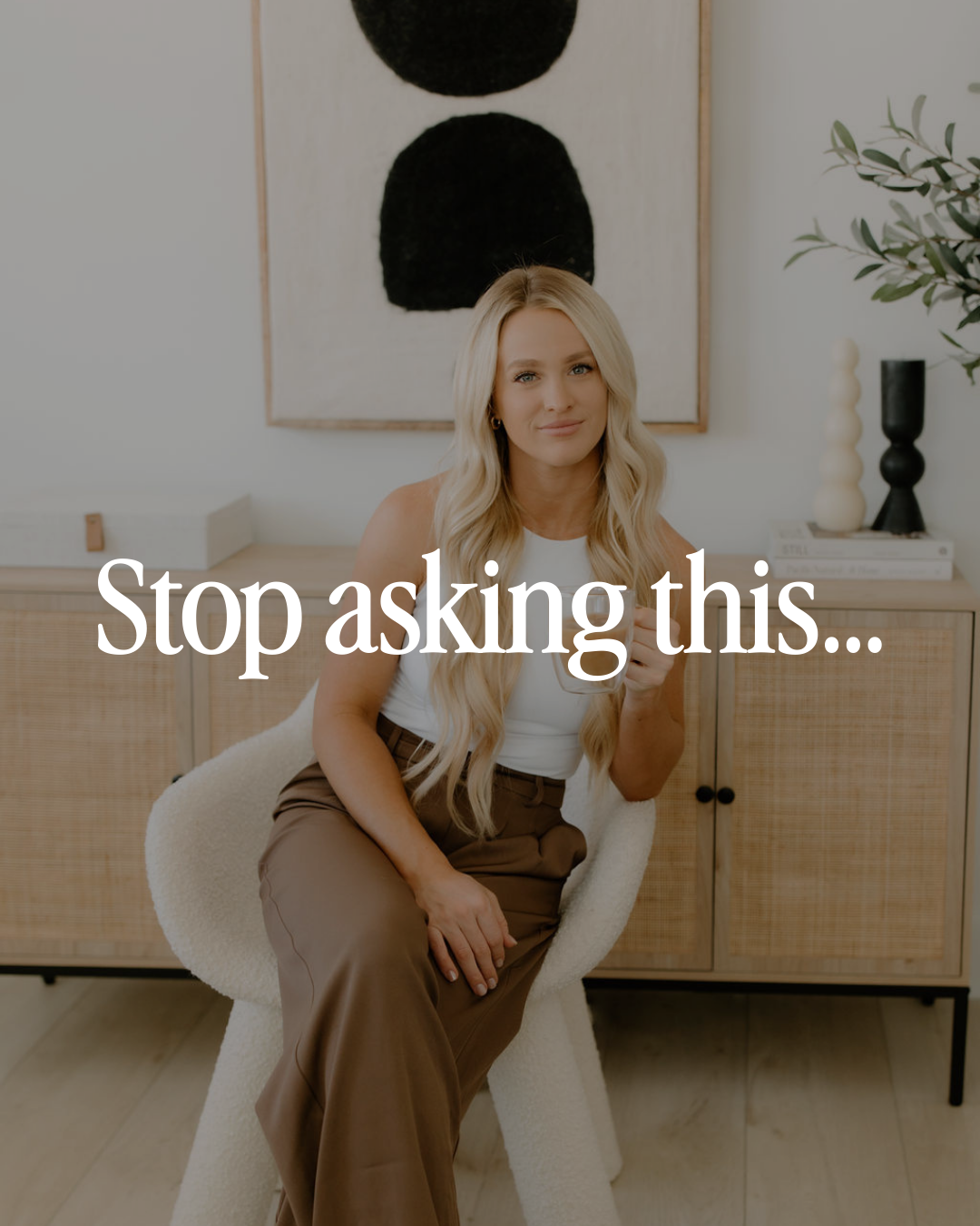 A real estate social media template featuring a realtor seated indoors in a modern living space with overlay text reading, “Stop asking this…”