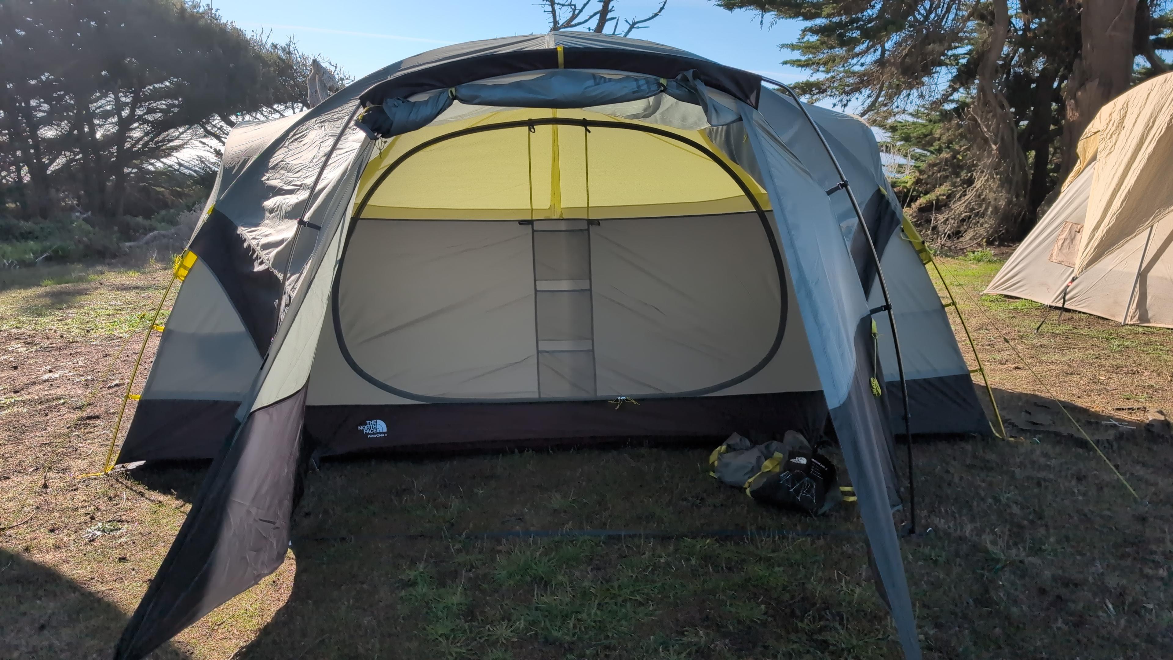 Fully assembled North Face Wawona 8 tent with full vestibule extension at a campsite