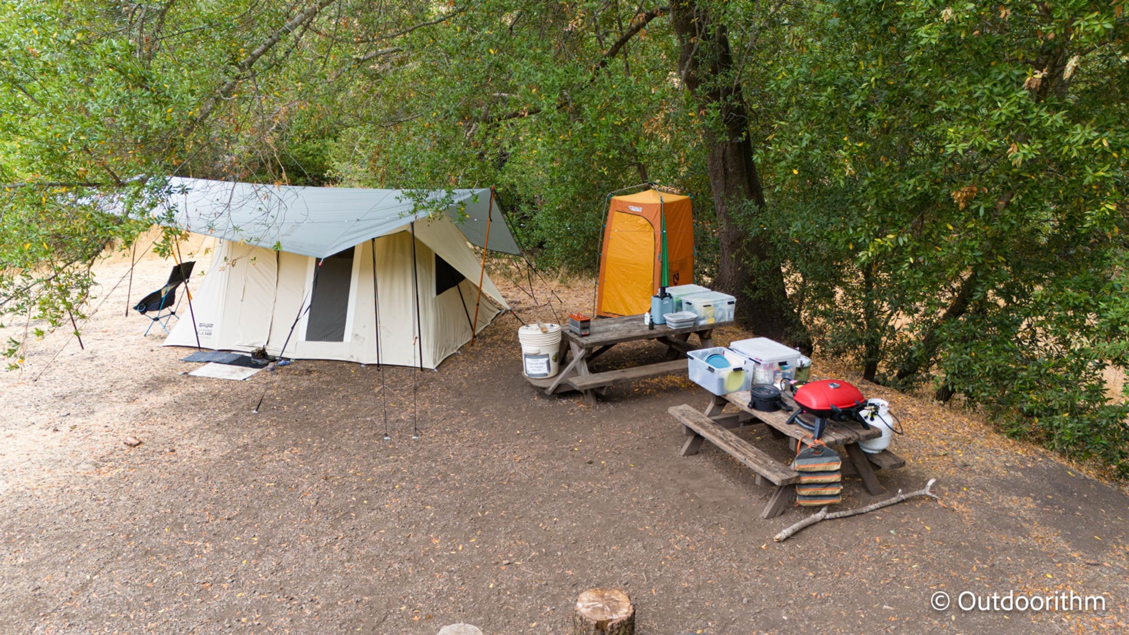 Springbar canvas tent setup in progress at Sugarloaf Ridge State Park with ground sheet laid out