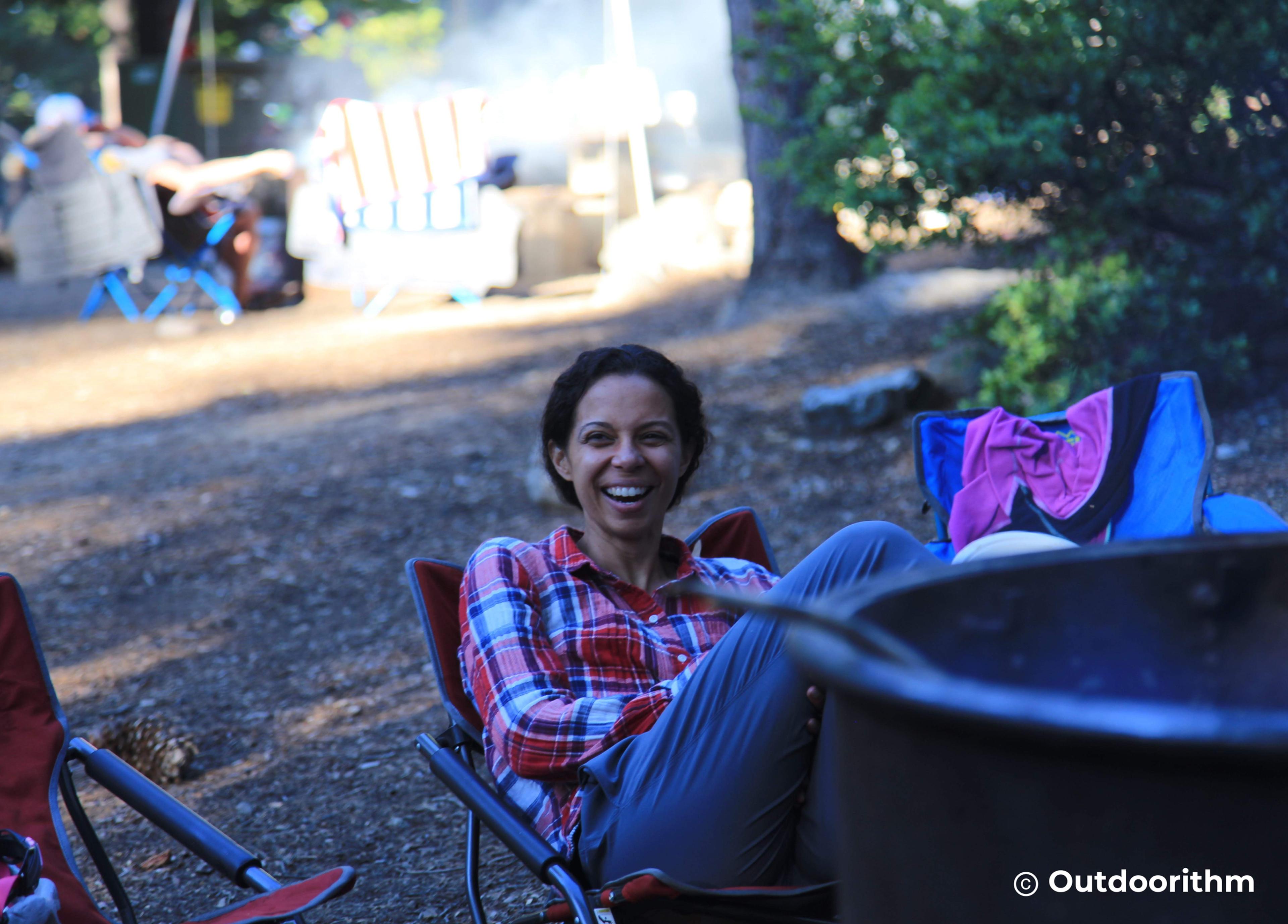 Sally Steele smiling outdoors in a flannel shirt at Lake Tahoe, California, finding joy in nature Sally Steele smiling outdoors in a flannel shirt at Lake Tahoe, California, finding joy in nature
