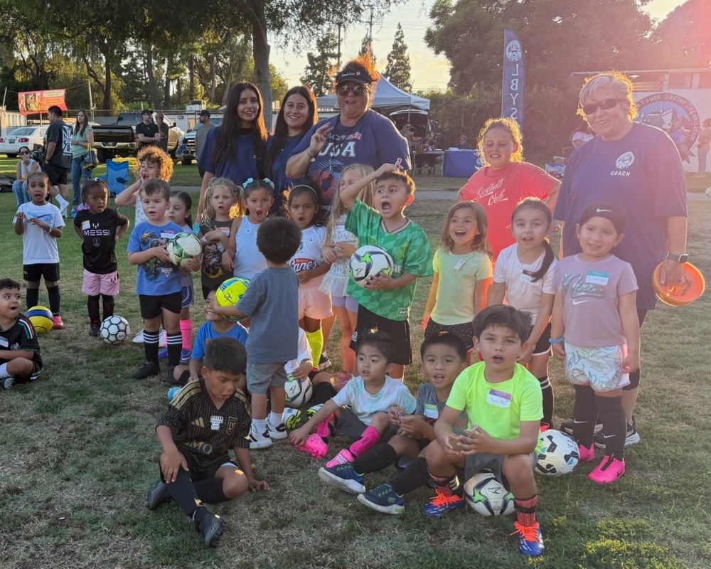 Coach Cece with a group of young players at Skills Night.
