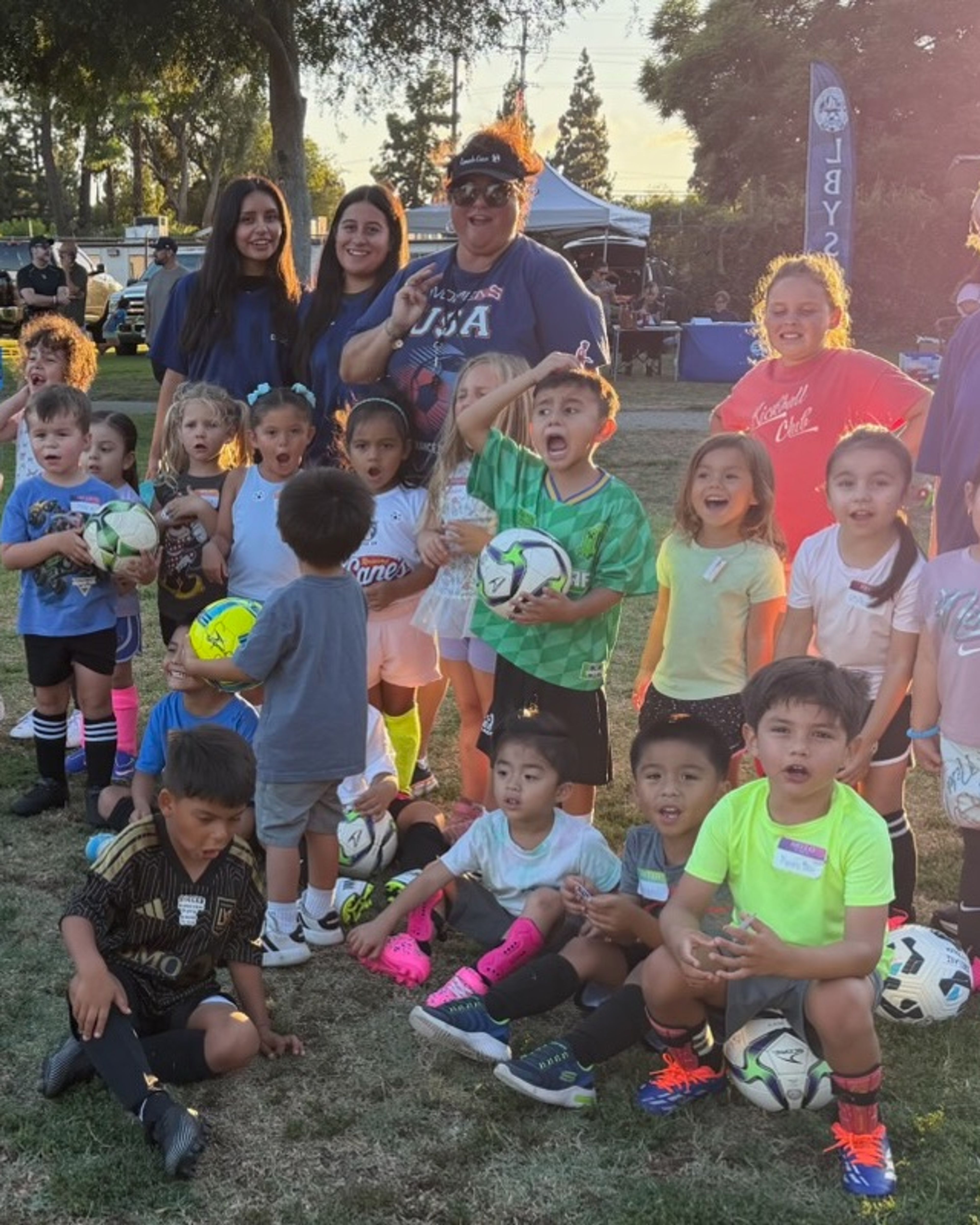Coach Cece with a group of young players at Skills Night.