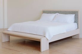 Planar bed in Walnut with Upholstered headboard