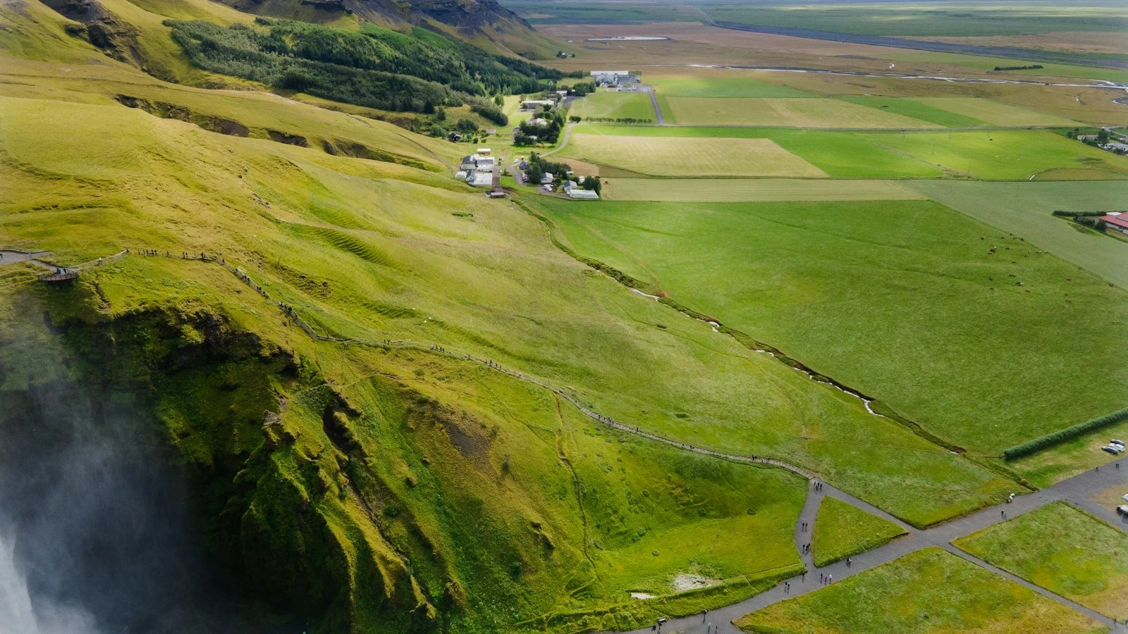 An aerial view of a valley with a river running through it