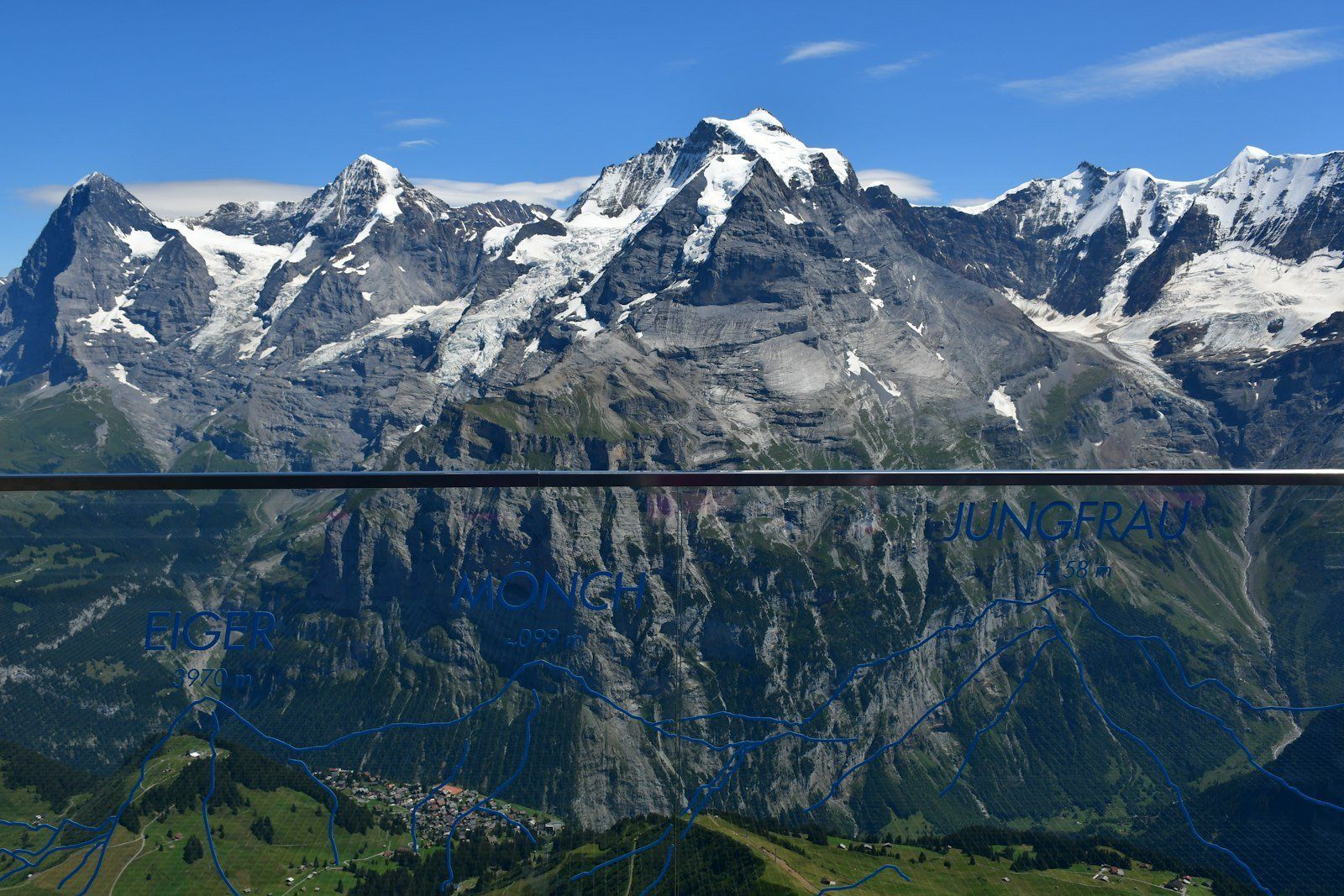 Eiger, Mönch and Jungfrau - an impressive mountain range in the heart of Switzerland. This viewpoint is located in Birg (8783 ft). 
