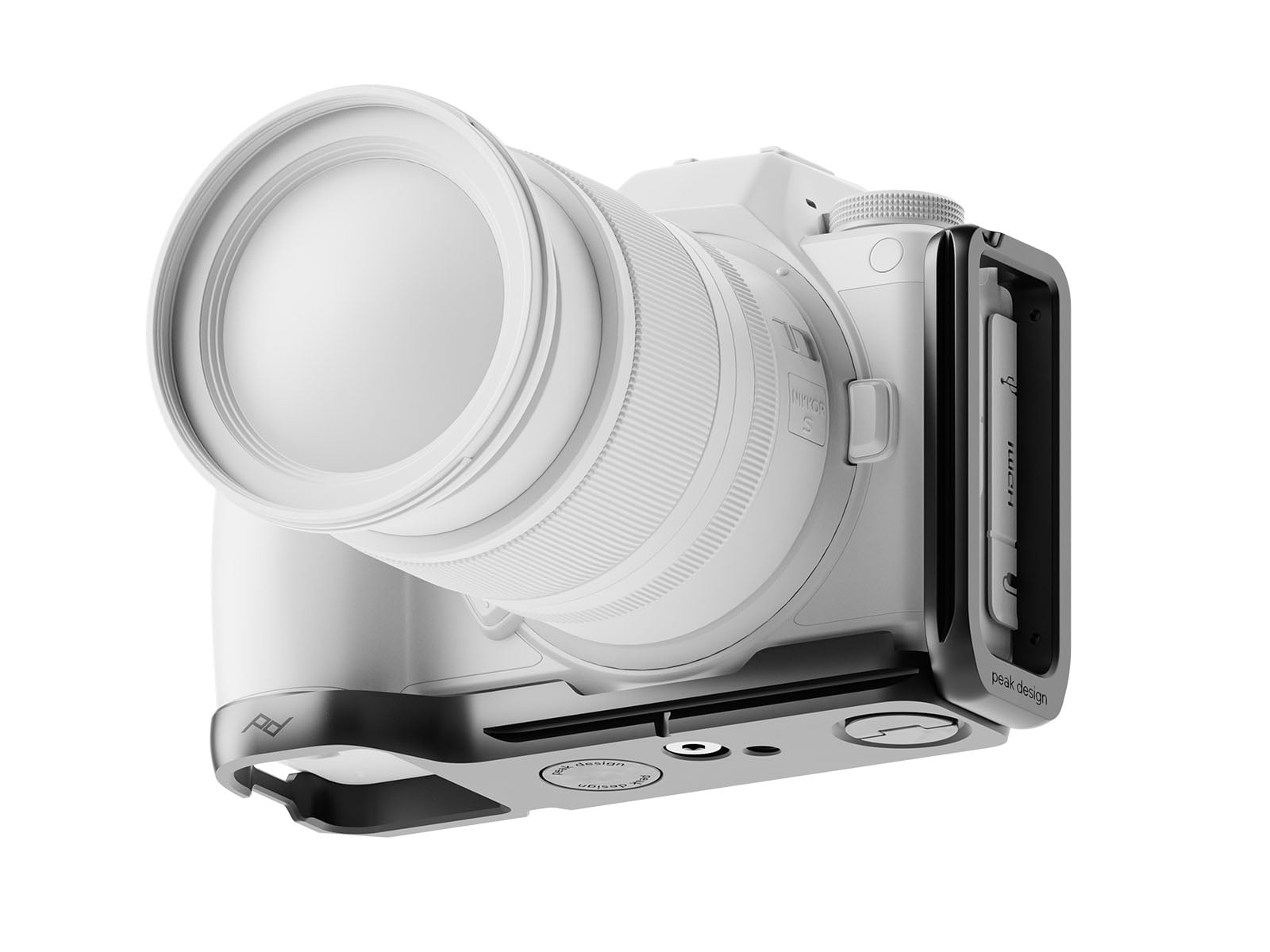 Peak Design Field Bracket mounted on a white mirrorless camera body, showing the L-shape and modular upright