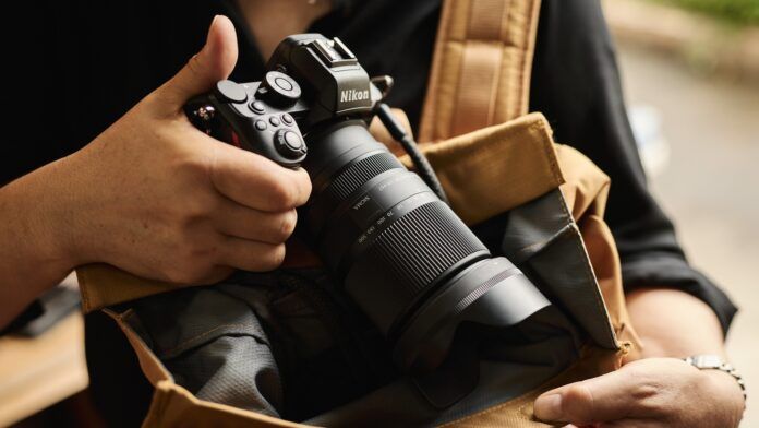Sigma 16-300mm f/3.5-6.7 DC OS Contemporary in use on a Nikon Z DX body, with the 18.8x zoom range illustrating the wide-to-telephoto reach.