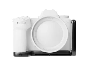 Peak Design Field Bracket mounted on a white mirrorless camera, modular upright and baseplate visible