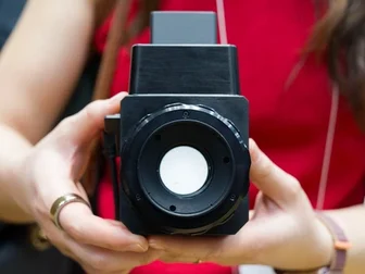 Canon prototype SLR-style concept camera with waist-level viewfinder on display at CP+ 2026 in Yokohama
