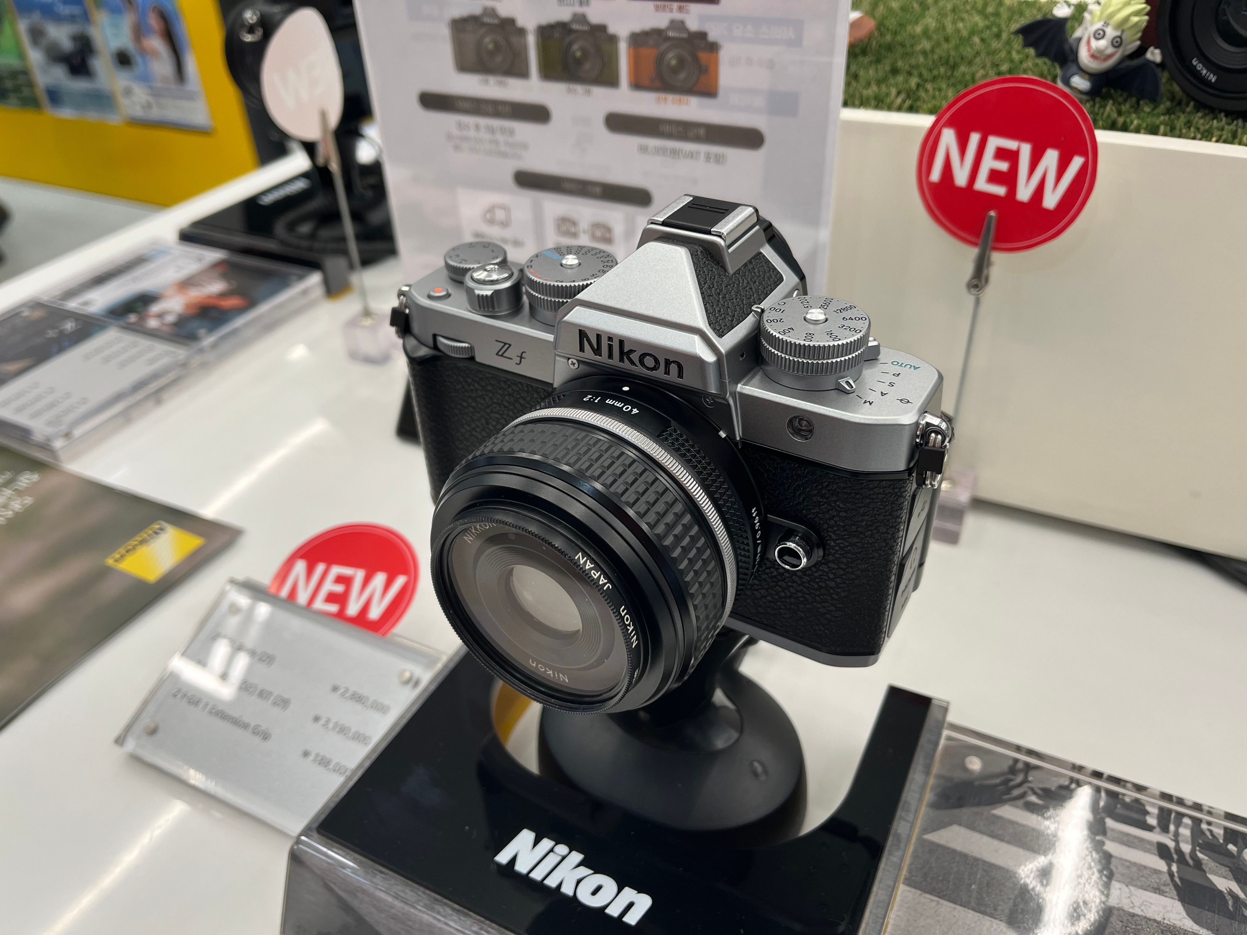 Nikon Zf silver and black mirrorless camera with retro dials