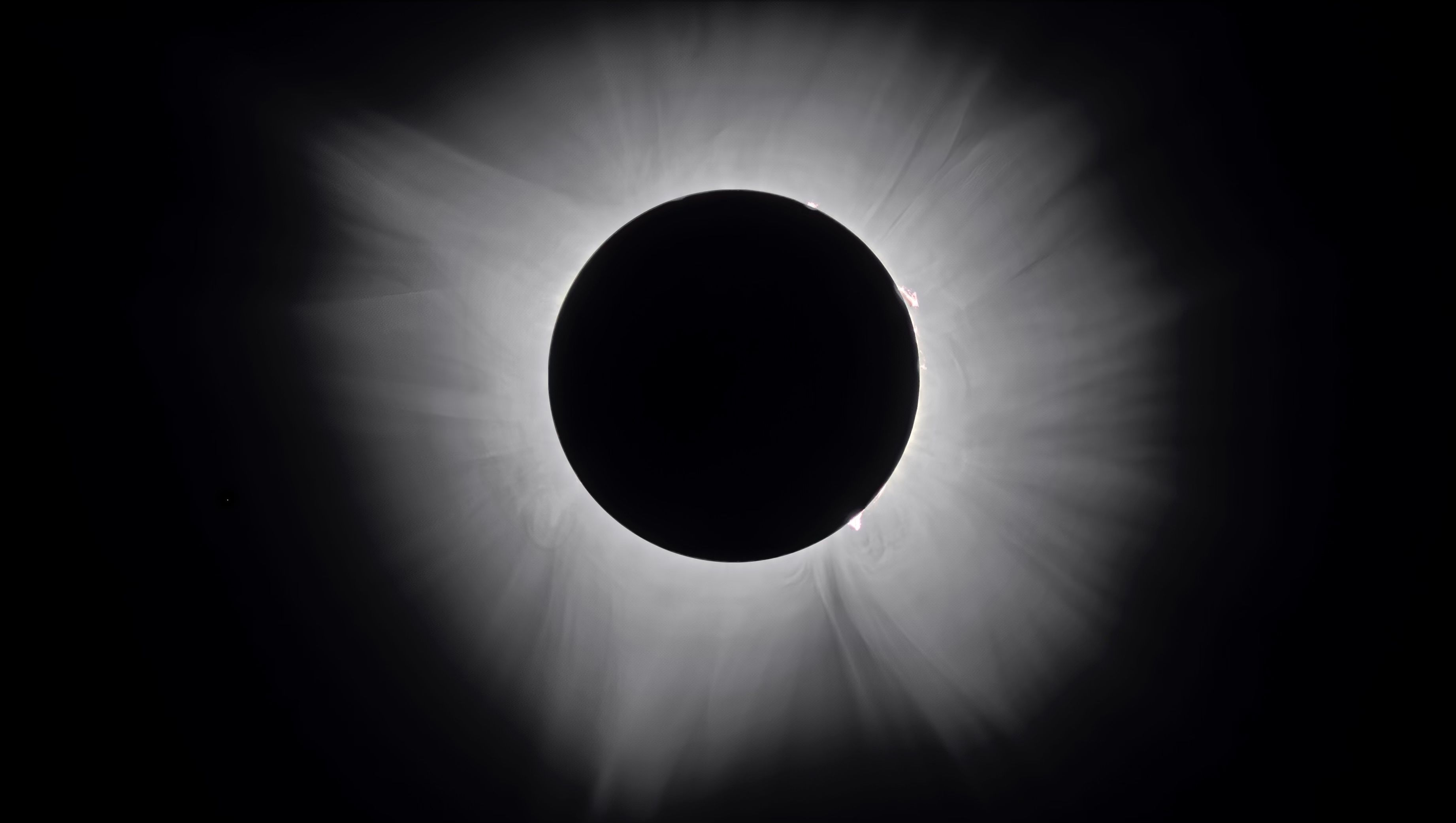 High-dynamic-range composite photograph of a total solar eclipse showing the sun corona during totality, photographed on April 8, 2024.