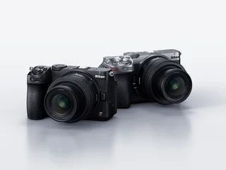 Nikon Z5IIC full-frame mirrorless camera, official press photo showing the flat-top rangefinder-style body with a NIKKOR Z 24-50mm f/4-6.3 lens attached