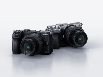 Nikon Z5IIC full-frame mirrorless camera, official press photo showing the flat-top rangefinder-style body with a NIKKOR Z 24-50mm f/4-6.3 lens attached