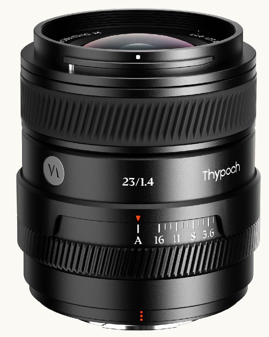 Front view of the Thypoch Sculptor AF 23mm f/1.4 showing the front element and the ten-blade aperture