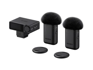 Sony ECM-W5 wireless microphone with windscreen mounted on a Sony mirrorless camera — Sony Alpha Universe press image.