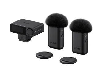 Sony ECM-W5 wireless microphone with windscreen mounted on a Sony mirrorless camera — Sony Alpha Universe press image.