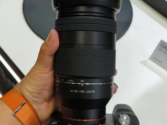 Schneider Kreuznach x LK Samyang AF 60-180mm f/2.8 FE lens displayed at CP+ 2026